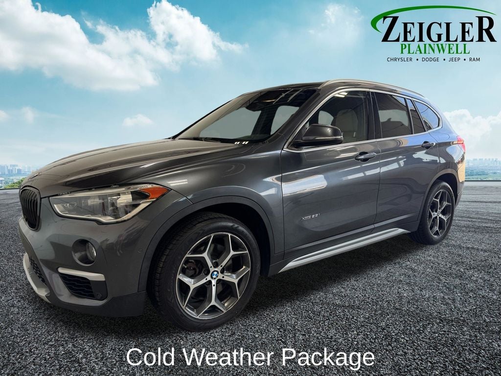 Used 2017 BMW X1 28i with VIN WBXHT3C37H5F74763 for sale in Plainwell, MI
